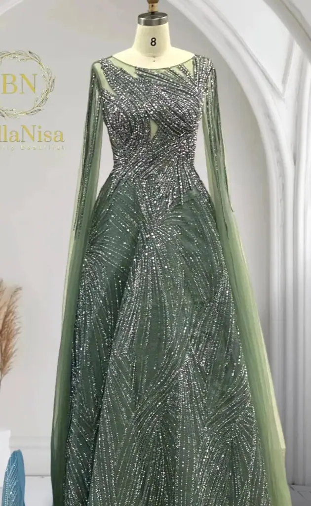 mother of the bride dress displayed on a mannequin at a wedding venue, showcasing elegant design for the special day.