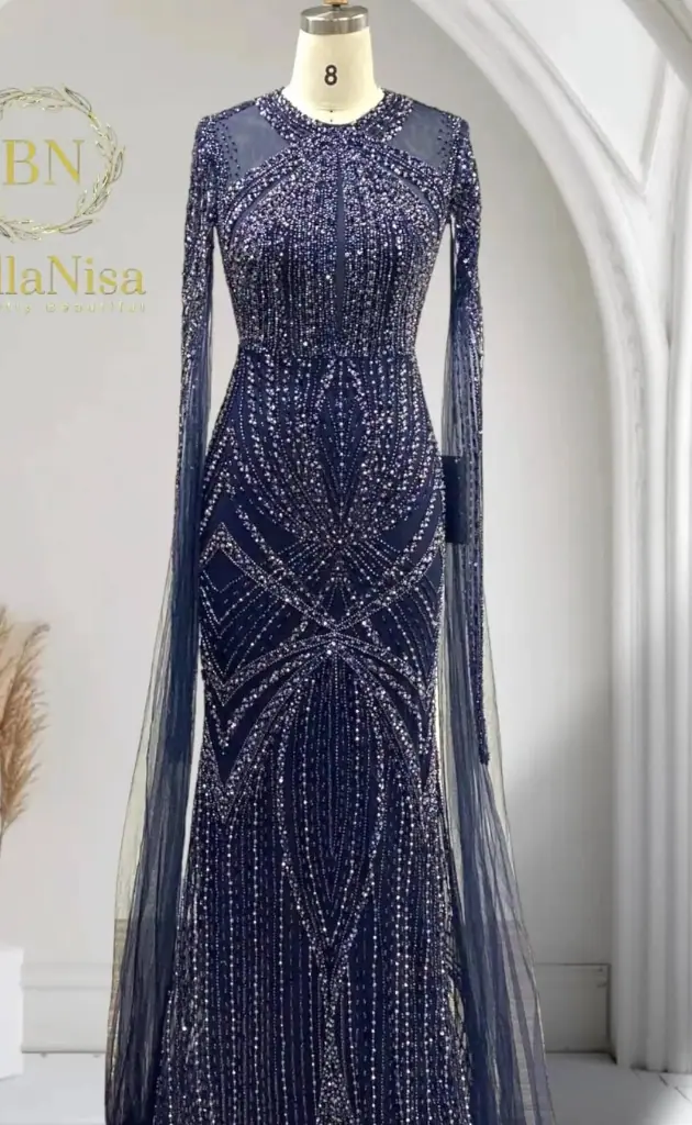 Blue mother of the bride dress displayed on a mannequin at a wedding venue, showcasing elegant design for the special day.