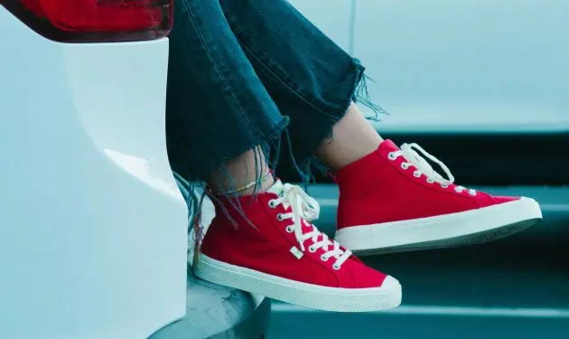 Girl wearing red shoes 